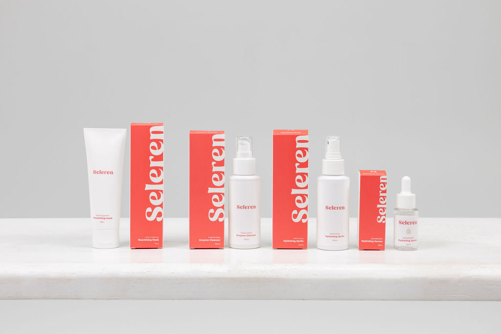 Set of Seleren skincare products on a white surface with a gray background